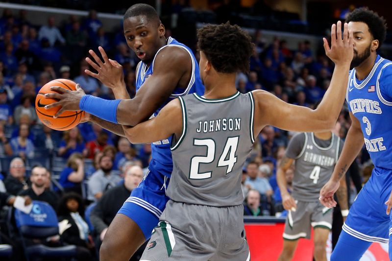 Mar 3, 2024; Memphis, Tennessee, USA; Memphis Tigers forward David Jones (8) drives to the basket as UAB Blazers guard Efrem Johnson (24) defends during the first half at FedExForum. Mandatory Credit: Petre Thomas-USA TODAY Sports