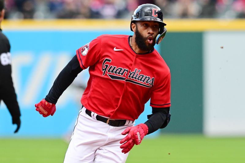 Apr 23, 2023; Cleveland, Ohio, USA; Cleveland Guardians shortstop Amed Rosario (1) rounds the bases en route to a triple during the third inning against the Miami Marlins at Progressive Field. Mandatory Credit: Ken Blaze-USA TODAY Sports