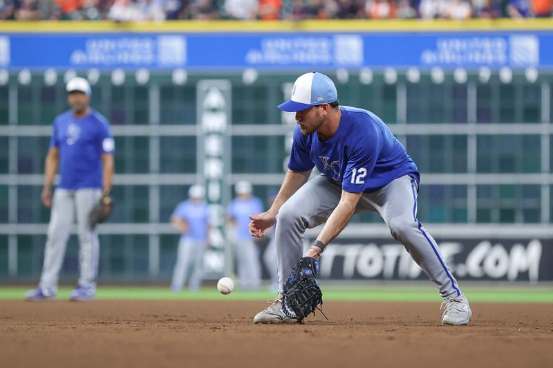 Aug 31, 2024; Houston, Texas, USA; Kansas City Royals first baseman Nick Loftin (12) takes ground balls at first base before the game against the Houston Astros at Minute Maid Park. Mandatory Credit: Troy Taormina-USA TODAY Sports