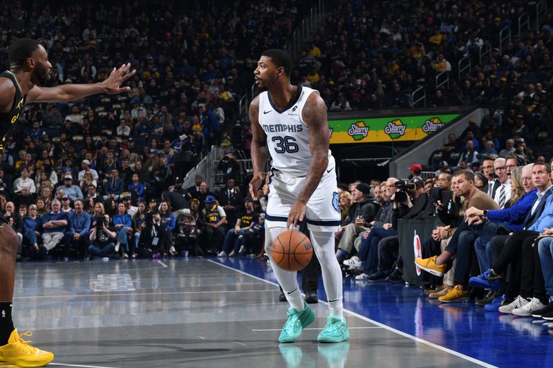 SAN FRANCISCO, CA - NOVEMBER 15: Marcus Smart #36 of the Memphis Grizzlies handles the ball during the game against the Golden State Warriors during the Emirates NBA Cup game on November 15, 2024 at Chase Center in San Francisco, California. NOTE TO USER: User expressly acknowledges and agrees that, by downloading and or using this photograph, user is consenting to the terms and conditions of Getty Images License Agreement. Mandatory Copyright Notice: Copyright 2024 NBAE (Photo by Noah Graham/NBAE via Getty Images)