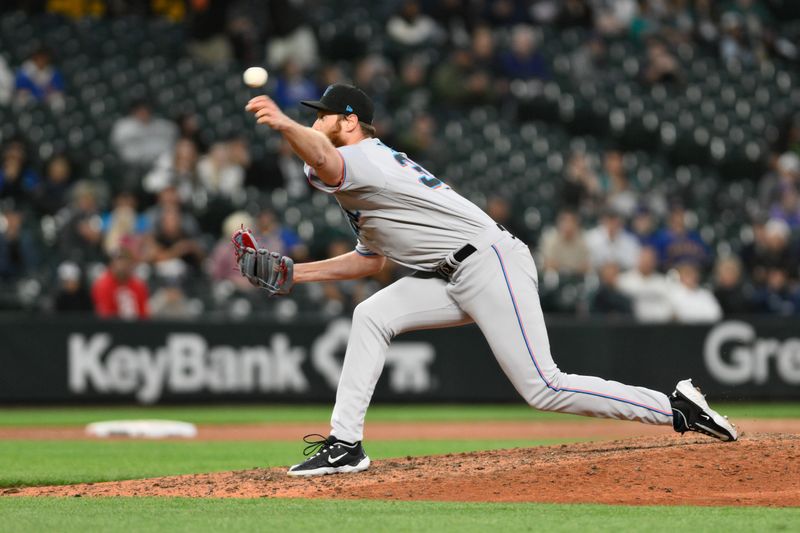 Jun 14, 2023; Seattle, Washington, USA; Miami Marlins relief pitcher A.J. Puk (35) pitches to the Seattle Mariners during the ninth inning at T-Mobile Park. Mandatory Credit: Steven Bisig-USA TODAY Sports