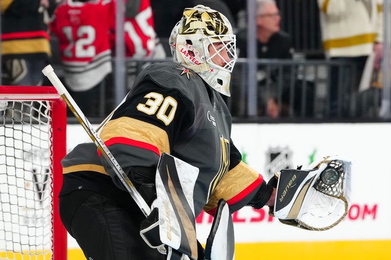 Dec 10, 2023; Las Vegas, Nevada, USA; Vegas Golden Knights goaltender Jiri Patera (30) warms up before the start of a game against the San Jose Sharks at T-Mobile Arena. Mandatory Credit: Stephen R. Sylvanie-USA TODAY Sports