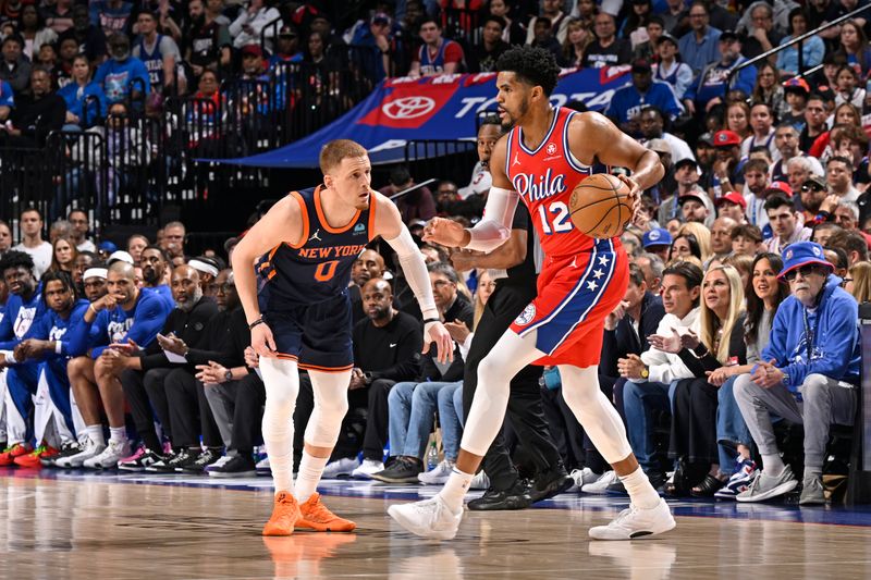 PHILADELPHIA, PA - APRIL 28: Tobias Harris #12 of the Philadelphia 76ers dribbles the ball during the game against the New York Knicks during Round 1 Game 4 of the 2024 NBA Playoffs on April 28, 2024 at the Wells Fargo Center in Philadelphia, Pennsylvania NOTE TO USER: User expressly acknowledges and agrees that, by downloading and/or using this Photograph, user is consenting to the terms and conditions of the Getty Images License Agreement. Mandatory Copyright Notice: Copyright 2024 NBAE (Photo by David Dow/NBAE via Getty Images)