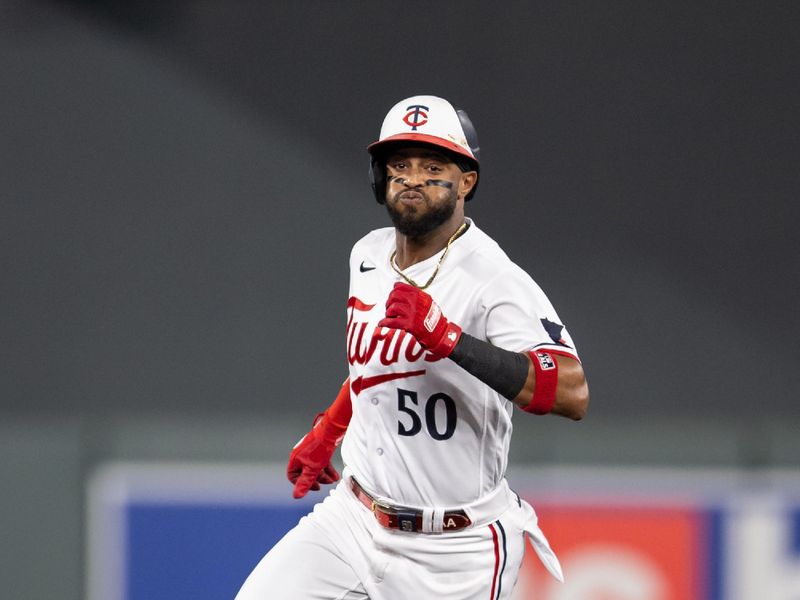 Sep 22, 2023; Minneapolis, Minnesota, USA; Minnesota Twins third baseman Willi Castro (50) hits a triple during the fourth inning against the Los Angeles Angels  at Target Field. Mandatory Credit: Jordan Johnson-USA TODAY Sports