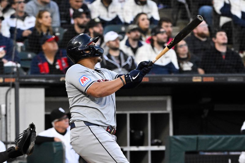 May 11, 2024; Chicago, Illinois, USA;  Cleveland Guardians first base Josh Naylor (22) hits a home run against the Chicago White Sox during the fourth inning at Guaranteed Rate Field. Mandatory Credit: Matt Marton-USA TODAY Sports