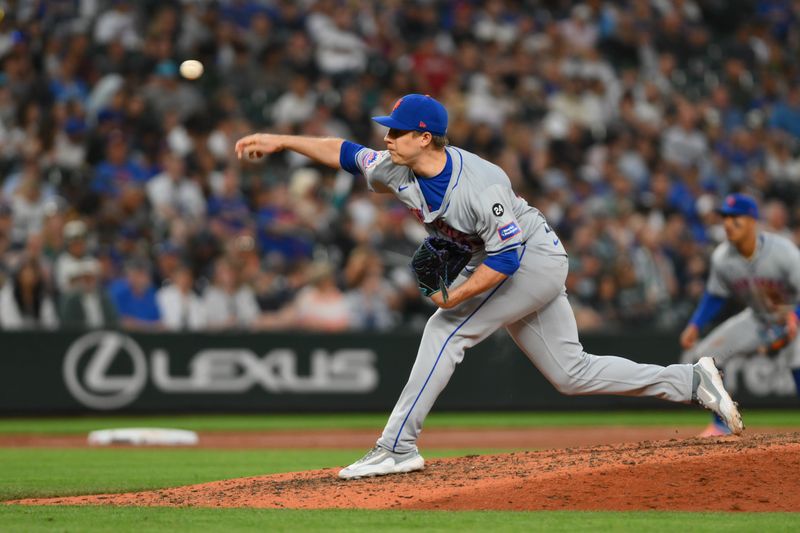 Aug 10, 2024; Seattle, Washington, USA; New York Mets relief pitcher Phil Maton (88) pitches to the Seattle Mariners during the seventh inning at T-Mobile Park. Mandatory Credit: Steven Bisig-USA TODAY Sports