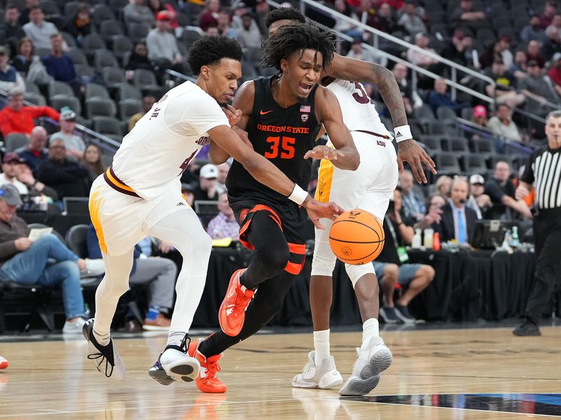 Mar 8, 2023; Las Vegas, NV, USA; Arizona State Sun Devils guard Desmond Cambridge Jr. (4) strips the ball from Oregon State Beavers forward Glenn Taylor Jr. (35) during the second half at T-Mobile Arena. Mandatory Credit: Stephen R. Sylvanie-USA TODAY Sports