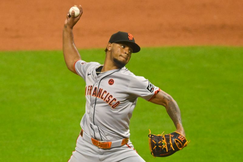 Jul 5, 2024; Cleveland, Ohio, USA; San Francisco Giants relief pitcher Camilo Doval (75) delivers a pitch in the ninth inning against the Cleveland Guardians at Progressive Field. Mandatory Credit: David Richard-USA TODAY Sports