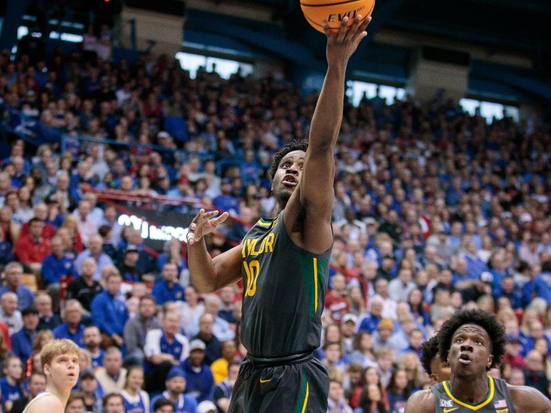 Feb 18, 2023; Lawrence, Kansas, USA; Baylor Bears guard Adam Flagler (10) puts up a shot during the first half against the Kansas Jayhawks at Allen Fieldhouse. Mandatory Credit: William Purnell-USA TODAY Sports