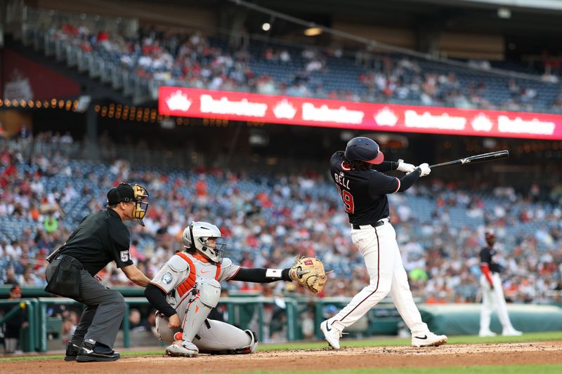 Apr 24, 2025; Washington, District of Columbia, USA; Washington Nationals first base Josh Bell (19) hits an RBI single against the Baltimore Orioles during the second inning at Nationals Park. Mandatory Credit: Geoff Burke-Imagn Images