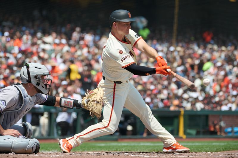 Jul 28, 2024; San Francisco, California, USA; San Francisco Giants infielder Matt Chapman (26) hits a single against the Colorado Rockies during the third inning at Oracle Park. Mandatory Credit: Robert Edwards-USA TODAY Sports