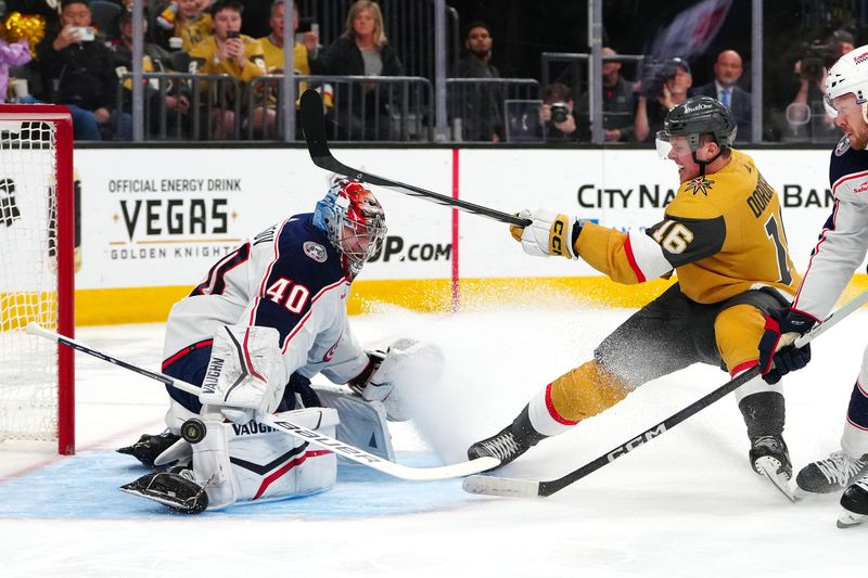 Mar 23, 2024; Las Vegas, Nevada, USA; Columbus Blue Jackets goaltender Daniil Tarasov (40) makes a save against Vegas Golden Knights left wing Pavel Dorofeyev (16) during the second period at T-Mobile Arena. Mandatory Credit: Stephen R. Sylvanie-USA TODAY Sports