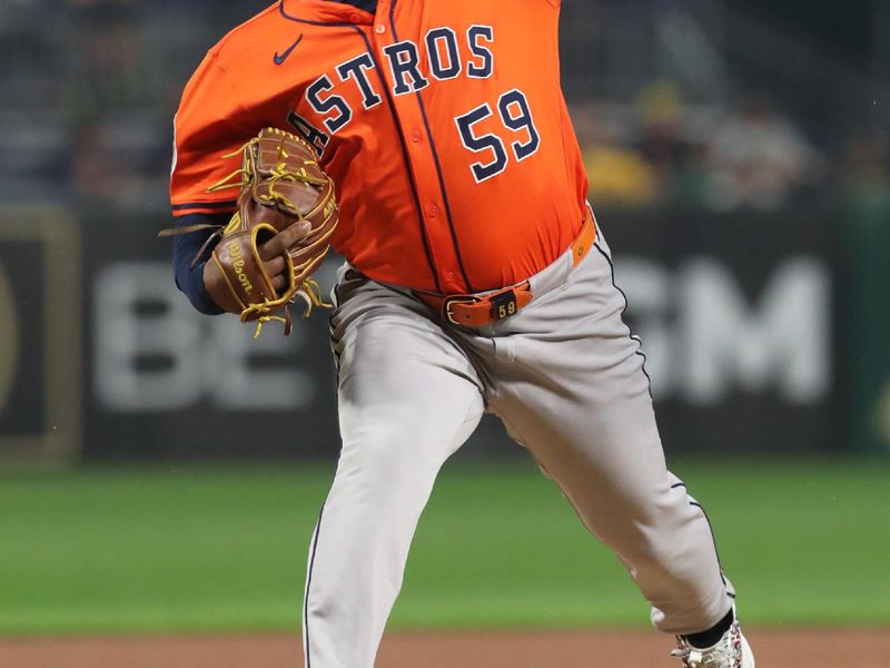 Jun 5, 2025; Pittsburgh, Pennsylvania, USA;  Houston Astros starting pitcher Framber Valdez (59) delivers a pitch against the Pittsburgh Pirates during the first inning at PNC Park. Mandatory Credit: Charles LeClaire-Imagn Images