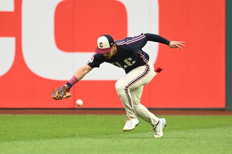 Jul 22, 2024; Cleveland, Ohio, USA; Cleveland Guardians left fielder Steven Kwan (38) can not get to a ball hit by Detroit Tigers left fielder Mark Canha (not pictured) during the third inning at Progressive Field. Mandatory Credit: Ken Blaze-USA TODAY Sports