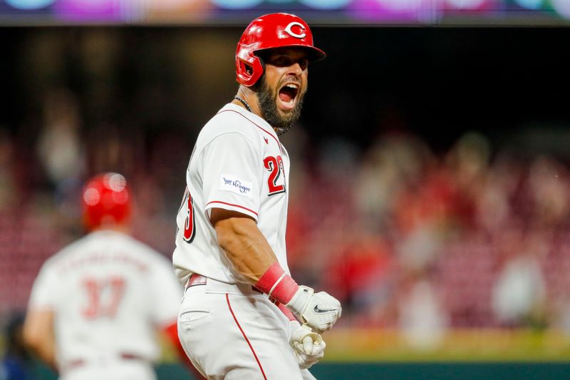 Sep 5, 2023; Cincinnati, Ohio, USA; Cincinnati Reds pinch hitter Nick Martini (23) reacts after hitting a three-run home run in the eighth inning against the Seattle Mariners at Great American Ball Park. Mandatory Credit: Katie Stratman-USA TODAY Sports