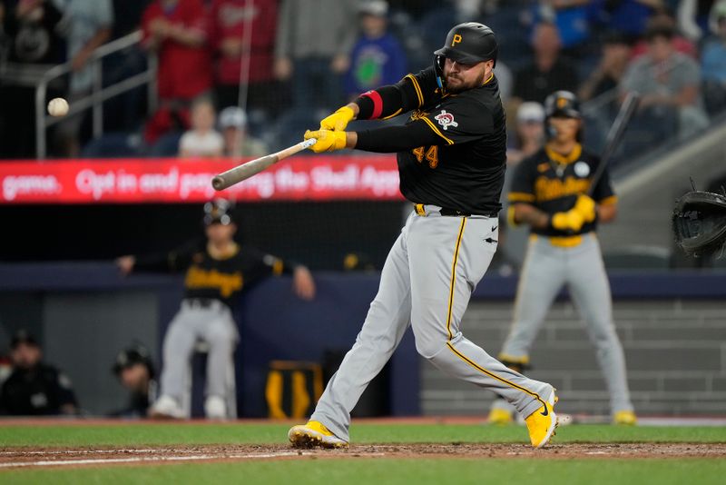 Jun 2, 2024; Toronto, Ontario, CAN; Pittsburgh Pirates first baseman Rowdy Tellez (44) hits an one run single against the Toronto Blue Jays during the ninth inning at Rogers Centre. Mandatory Credit: John E. Sokolowski-USA TODAY Sports