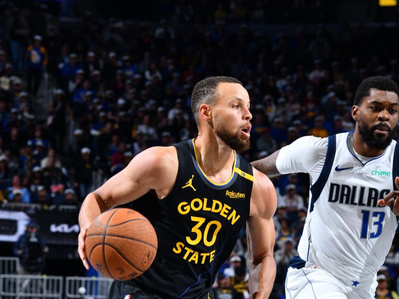 PHOENIX, AZ - NOVEMBER 12: Stephen Curry #30 of the Golden State Warriors dribbles the ball during the game against the Dallas Mavericks during the Emirates NBA Cup game on November 12, 2024 at Footprint Center in Phoenix, Arizona. NOTE TO USER: User expressly acknowledges and agrees that, by downloading and or using this photograph, user is consenting to the terms and conditions of the Getty Images License Agreement. Mandatory Copyright Notice: Copyright 2024 NBAE (Photo by Barry Gossage/NBAE via Getty Images)