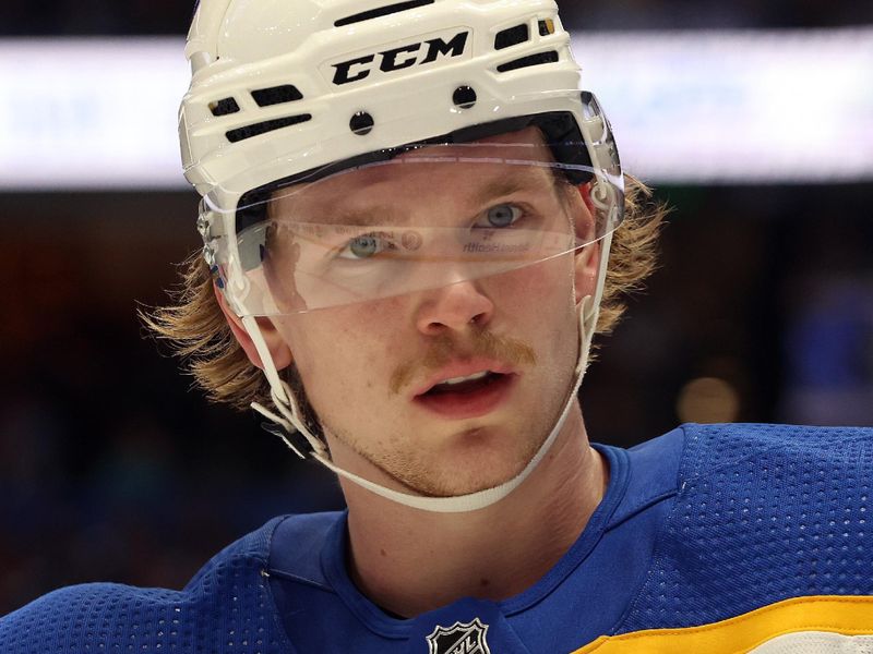 Apr 15, 2024; Tampa, Florida, USA;  Buffalo Sabres defenseman Bowen Byram (4) looks on against the Tampa Bay Lightning during the first period at Amalie Arena. Mandatory Credit: Kim Klement Neitzel-USA TODAY Sports