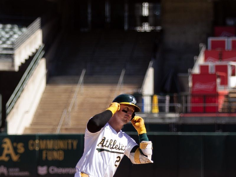 Sep 5, 2024; Oakland, California, USA; Oakland Athletics designated hitter Brent Rooker (25) runs out his solo home run against the Seattle Mariners during the sixth inning at Oakland-Alameda County Coliseum. Mandatory Credit: D. Ross Cameron-Imagn Images