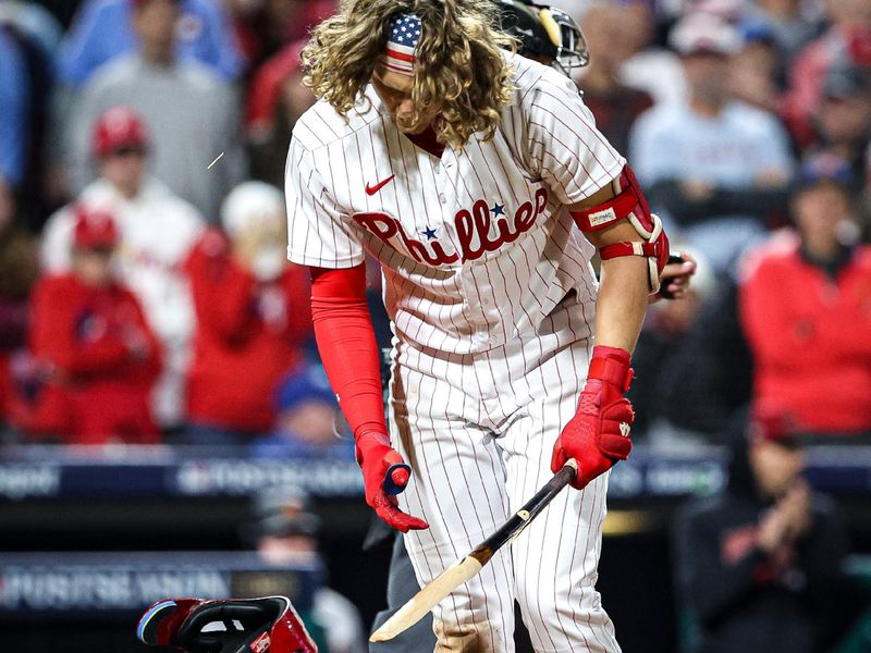 Oct 24, 2023; Philadelphia, Pennsylvania, USA; Philadelphia Phillies first baseman Alec Bohm (28) slams his bat after striking out against the Arizona Diamondbacks in the eighth inning for game seven of the NLCS for the 2023 MLB playoffs at Citizens Bank Park. Mandatory Credit: Bill Streicher-USA TODAY Sports