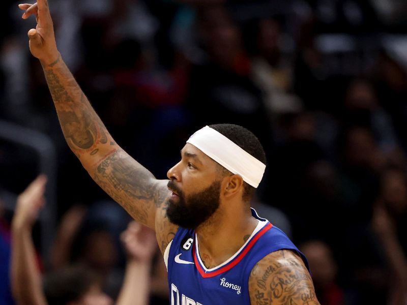 LOS ANGELES, CALIFORNIA - JANUARY 02: Marcus Morris Sr. #8 of the Los Angeles Clippers reacts to a three point basket during the third quarter against the Miami Heat at Crypto.com Arena on January 02, 2023 in Los Angeles, California. NOTE TO USER: User expressly acknowledges and agrees that, by downloading and or using this photograph, User is consenting to the terms and conditions of the Getty Images License Agreement. (Photo by Katelyn Mulcahy/Getty Images)