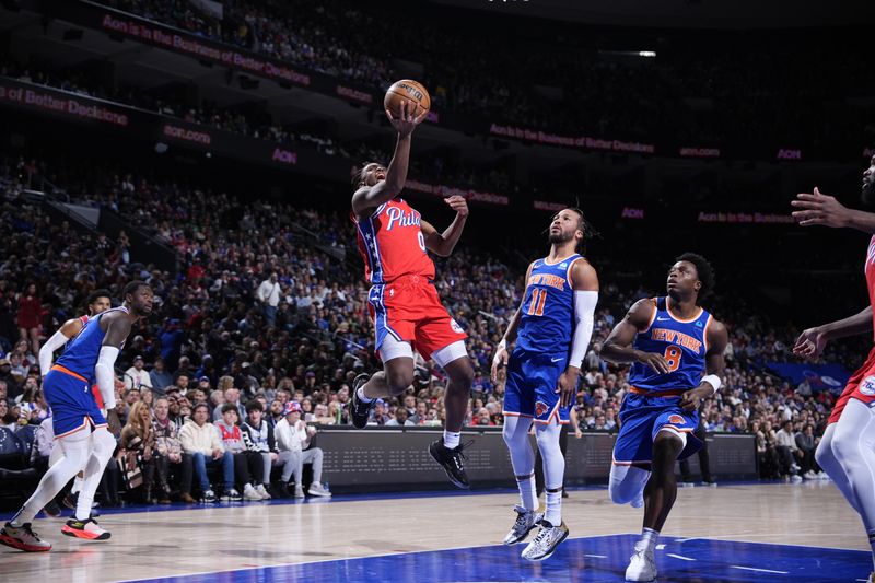 PHILADELPHIA, PA - JANUARY 5: Tyrese Maxey #0 of the Philadelphia 76ers drives to the basket during the game against the New York Knicks on January 5, 2024 at the Wells Fargo Center in Philadelphia, Pennsylvania NOTE TO USER: User expressly acknowledges and agrees that, by downloading and/or using this Photograph, user is consenting to the terms and conditions of the Getty Images License Agreement. Mandatory Copyright Notice: Copyright 2024 NBAE (Photo by Jesse D. Garrabrant/NBAE via Getty Images)