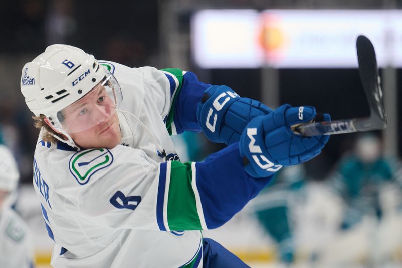 Nov 2, 2024; San Jose, California, USA; Vancouver Canucks right wing Brock Boeser (6) warms up on the ice before the game between the Vancouver Canucks and the San Jose Sharks at SAP Center at San Jose. Mandatory Credit: Robert Edwards-Imagn Images