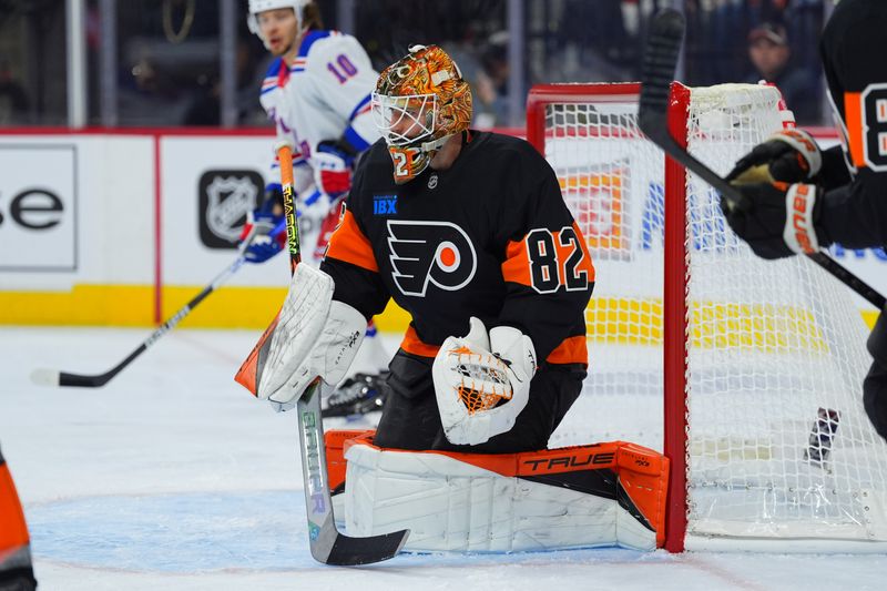 Nov 29, 2024; Philadelphia, Pennsylvania, USA; Philadelphia Flyers goalie Ivan Fedotov (82) defends the net against the New York Rangers in the second period at Wells Fargo Center. Mandatory Credit: Kyle Ross-Imagn Images