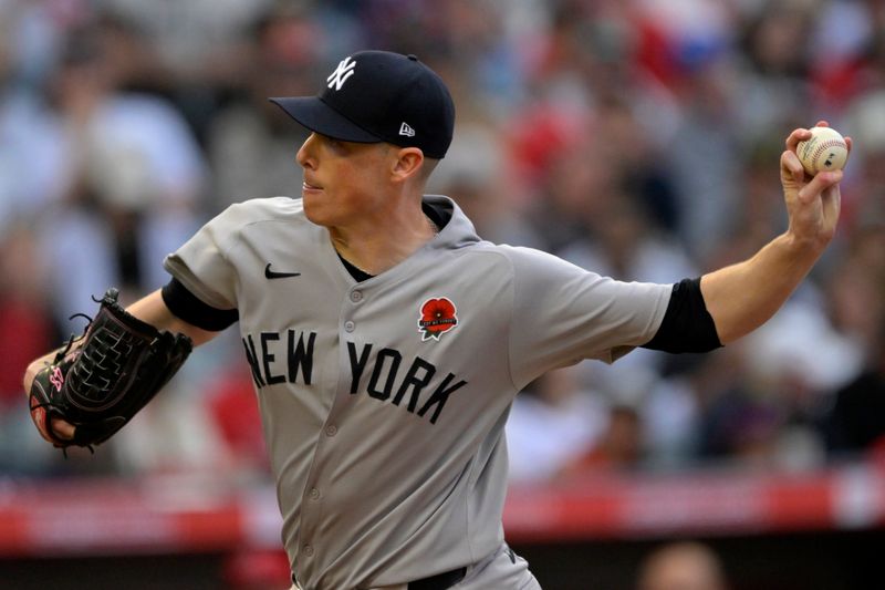 May 26, 2025; Anaheim, California, USA;  New York Yankees starting pitcher Ryan Yarbrough (33) delivers to the plate in the first inning against the Los Angeles Angels at Angel Stadium. Mandatory Credit: Jayne Kamin-Oncea-Imagn Images