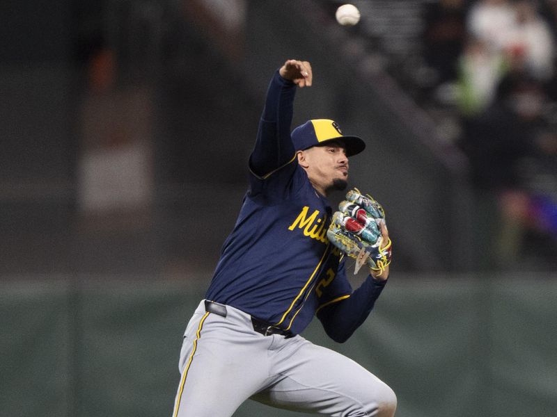 Sep 10, 2024; San Francisco, California, USA;  Milwaukee Brewers shortstop Willy Adames (27) throws the ball during the ninth inning against the San Francisco Giants at Oracle Park. Mandatory Credit: Stan Szeto-Imagn Images