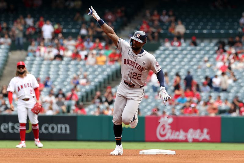 Sep 15, 2024; Anaheim, California, USA;  Houston Astros left fielder Jason Heyward (22) reacts after hitting a home run during the third inning against the Los Angeles Angels at Angel Stadium. Mandatory Credit: Kiyoshi Mio-Imagn Images