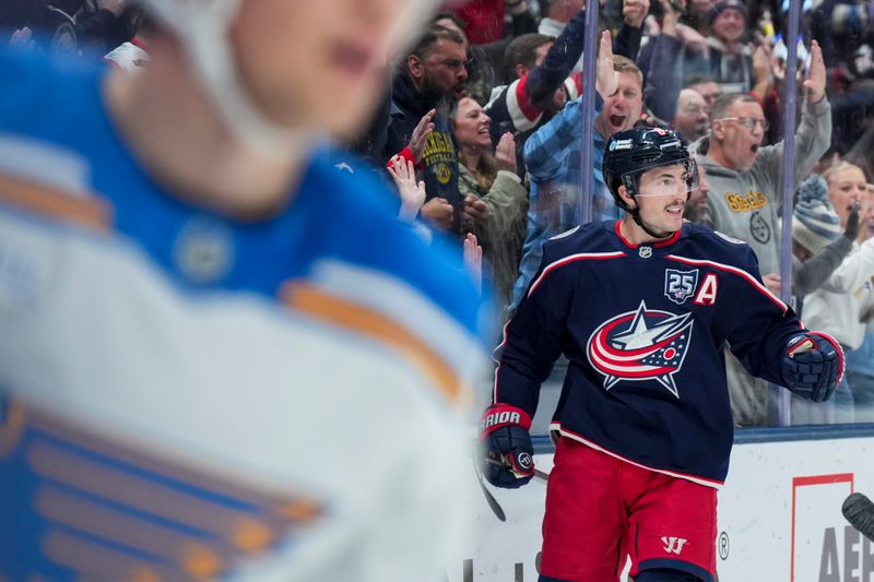 Nov 1, 2025; Columbus, Ohio, USA;  Columbus Blue Jackets defenseman Zach Werenski (8) reacts to scoring a goal against the St. Louis Blues in the second period at Nationwide Arena. Mandatory Credit: Aaron Doster-Imagn Images