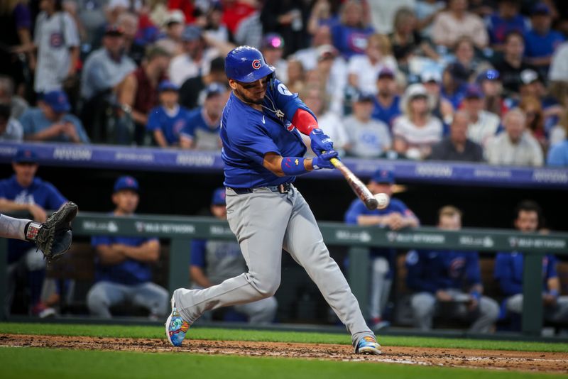 Sep 14, 2024; Denver, Colorado, USA; Chicago Cubs third base Isaac Paredes (17) bats against the Colorado Rockies at Coors Field. Mandatory Credit: Chet Strange-Imagn Images