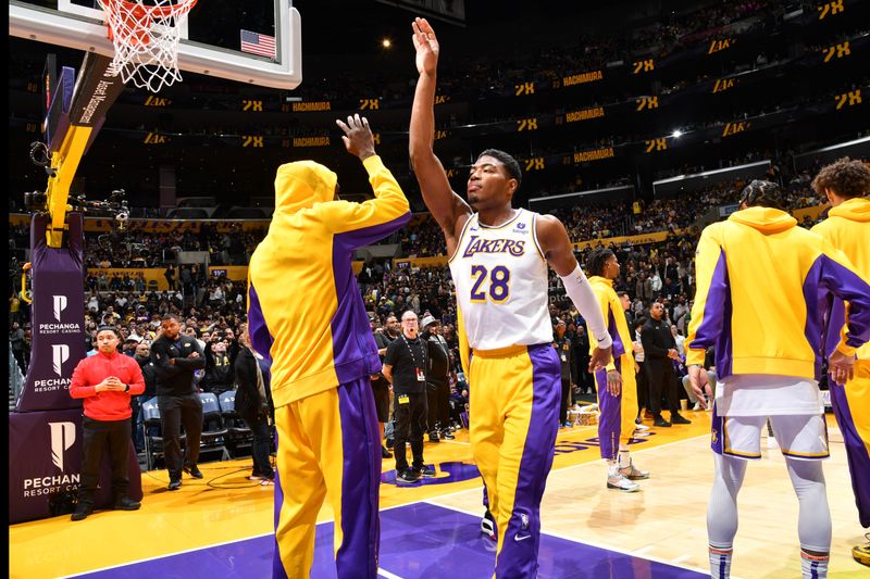 LOS ANGELES, CA - APRIL 7: Rui Hachimura #28 of the Los Angeles Lakers is introduced before the game against the Minnesota Timberwolves on April 7, 2024 at Crypto.Com Arena in Los Angeles, California. NOTE TO USER: User expressly acknowledges and agrees that, by downloading and/or using this Photograph, user is consenting to the terms and conditions of the Getty Images License Agreement. Mandatory Copyright Notice: Copyright 2024 NBAE (Photo by Juan Ocampo/NBAE via Getty Images)