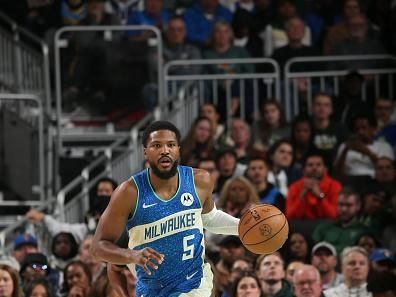 MILWAUKEE, WI - NOVEMBER 24: Malik Beasley #5 of the Milwaukee Bucks brings the ball up court against the Washington Wizards during the In-Season Tournament on November 24, 2023 at the Fiserv Forum Center in Milwaukee, Wisconsin. NOTE TO USER: User expressly acknowledges and agrees that, by downloading and or using this Photograph, user is consenting to the terms and conditions of the Getty Images License Agreement. Mandatory Copyright Notice: Copyright 2023 NBAE (Photo by Gary Dineen/NBAE via Getty Images).