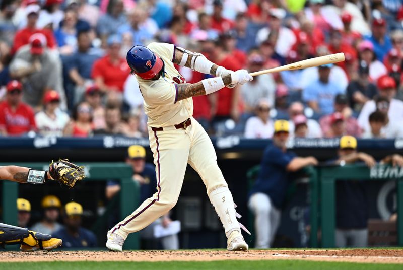 Jun 5, 2024; Philadelphia, Pennsylvania, USA; Philadelphia Phillies outfielder Nick Castellanos (8) hits a two-run home run against the Milwaukee Brewers in the fifth inning at Citizens Bank Park. Mandatory Credit: Kyle Ross-USA TODAY Sports