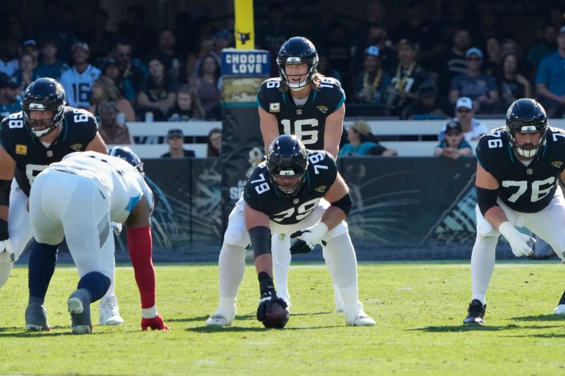 Jacksonville Jaguars quarterback Trevor Lawrence (16) calls a play at the line of scrimmage during the first half of an NFL football game against the Tennessee Titans, Sunday, Nov. 19, 2023, in Jacksonville, Fla. (AP Photo/John Raoux)