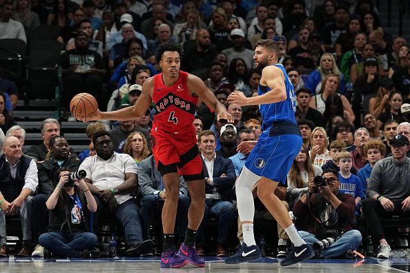 DALLAS, TX - NOVEMBER 8: Scottie Barnes #4 of the Toronto Raptors looks to pass the ball during the game against the Dallas Mavericks on November 8, 2023 at the American Airlines Center in Dallas, Texas. NOTE TO USER: User expressly acknowledges and agrees that, by downloading and or using this photograph, User is consenting to the terms and conditions of the Getty Images License Agreement. Mandatory Copyright Notice: Copyright 2023 NBAE (Photo by Glenn James/NBAE via Getty Images)