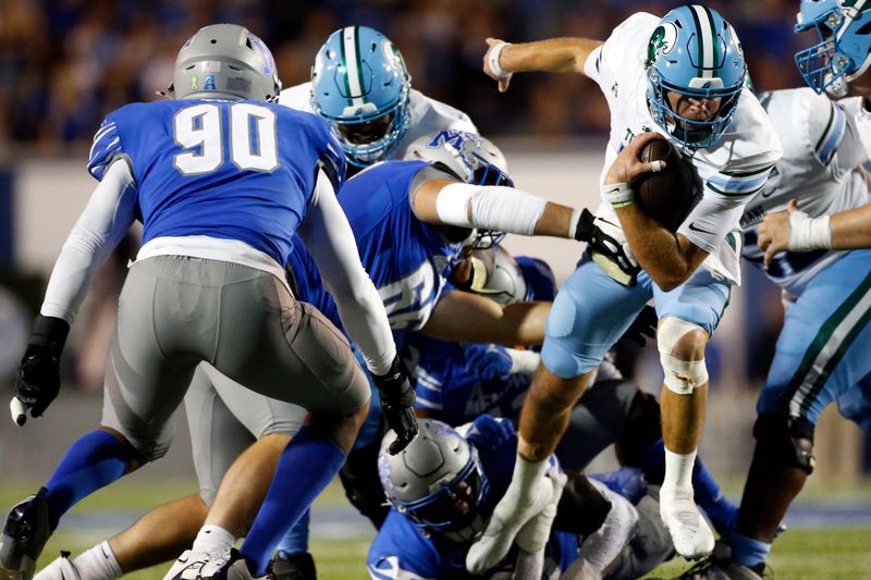 Oct 13, 2023; Memphis, Tennessee, USA; Tulane Green Wave quarterback Michael Pratt (7) runs with the ball during the first half against the Memphis Tigers at Simmons Bank Liberty Stadium. Mandatory Credit: Petre Thomas-USA TODAY Sports