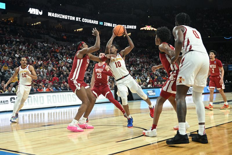 Mar 23, 2024; Omaha, NE, USA; Iowa State Cyclones guard Keshon Gilbert (10) shoots the ball against Washington State Cougars forward Isaac Jones (13) in the first half of the second round of the 2024 NCAA Tournament at CHI Health Center Omaha. Mandatory Credit: Steven Branscombe-USA TODAY Sports