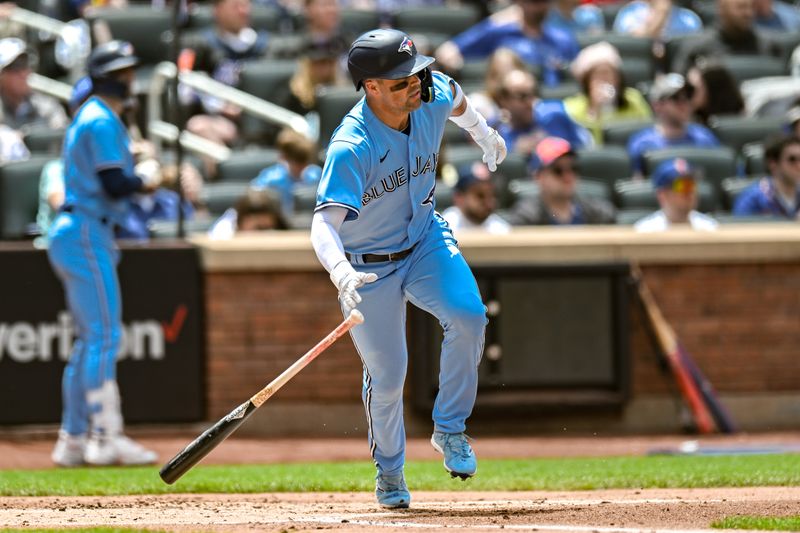 Jun 4, 2023; New York City, New York, USA; Toronto Blue Jays second baseman Whit Merrifield (15) hits a two RBI double against the New York Mets during the second inning at Citi Field. Mandatory Credit: John Jones-USA TODAY Sports