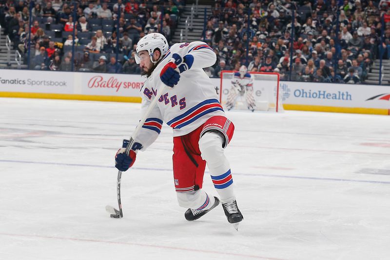 Oct 14, 2023; Columbus, Ohio, USA; New York Rangers center Mika Zibanejad (93) takes a slap shot against the Columbus Blue Jackets during the third period at Nationwide Arena. Mandatory Credit: Russell LaBounty-USA TODAY Sports