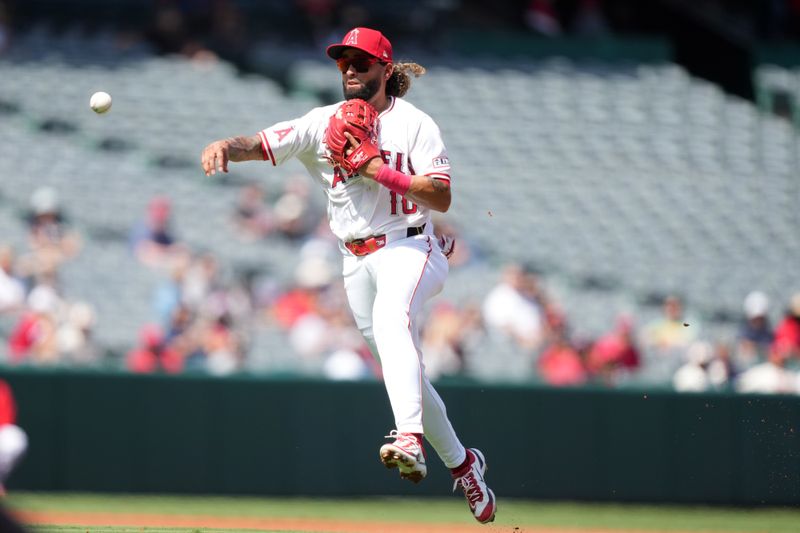 Sep 18, 2024; Anaheim, California, USA; Los Angeles Angels shortstop Jack Lopez (10) throws to first base in the second inning against the Chicago White Sox at Angel Stadium. Mandatory Credit: Kirby Lee-Imagn Images