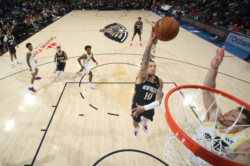 NEW ORLEANS, LA - JANUARY 17:  Daniel Theis #10 of the New Orleans Pelicans shoots the ball during the game against the Utah Jazz on January 17, 2025 at the Smoothie King Center in New Orleans, Louisiana. NOTE TO USER: User expressly acknowledges and agrees that, by downloading and or using this Photograph, user is consenting to the terms and conditions of the Getty Images License Agreement. Mandatory Copyright Notice: Copyright 2025 NBAE (Photo by Layne Murdoch Jr./NBAE via Getty Images)