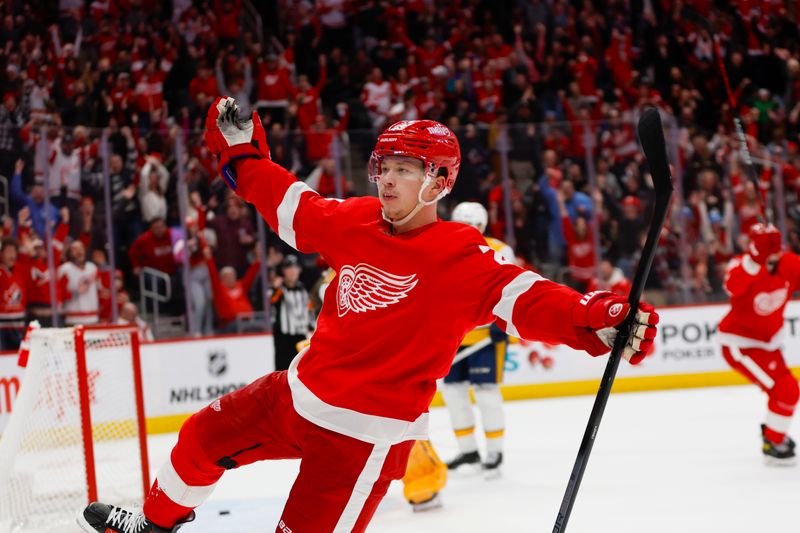 Dec 29, 2023; Detroit, Michigan, USA; Detroit Red Wings left wing Lucas Raymond (23) celebrates his game winning shot during the an overtime period of the game between the Detroit Red Wings and the Nashville Predators at Little Caesars Arena. Mandatory Credit: Brian Bradshaw Sevald-USA TODAY Sports