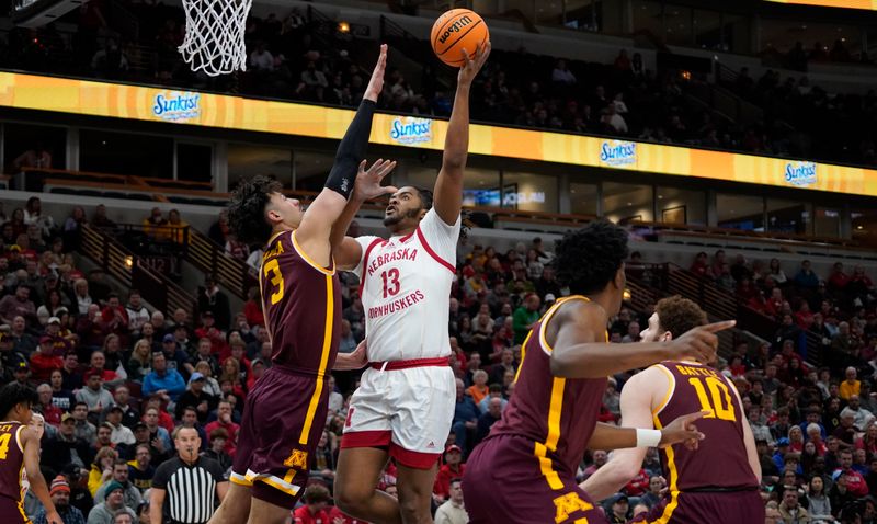 Mar 8, 2023; Chicago, IL, USA; Nebraska Cornhuskers forward Derrick Walker (13) shoots over Minnesota Golden Gophers forward Dawson Garcia (3) during the first half at United Center. Mandatory Credit: David Banks-USA TODAY Sports