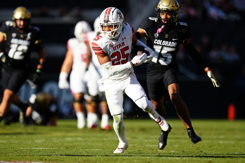 Nov 26, 2022; Boulder, Colorado, USA; Utah Utes wide receiver Jaylen Dixon (25) carries the ball in the first quarter against the Colorado Buffaloes at Folsom Field. Mandatory Credit: Ron Chenoy-USA TODAY Sports