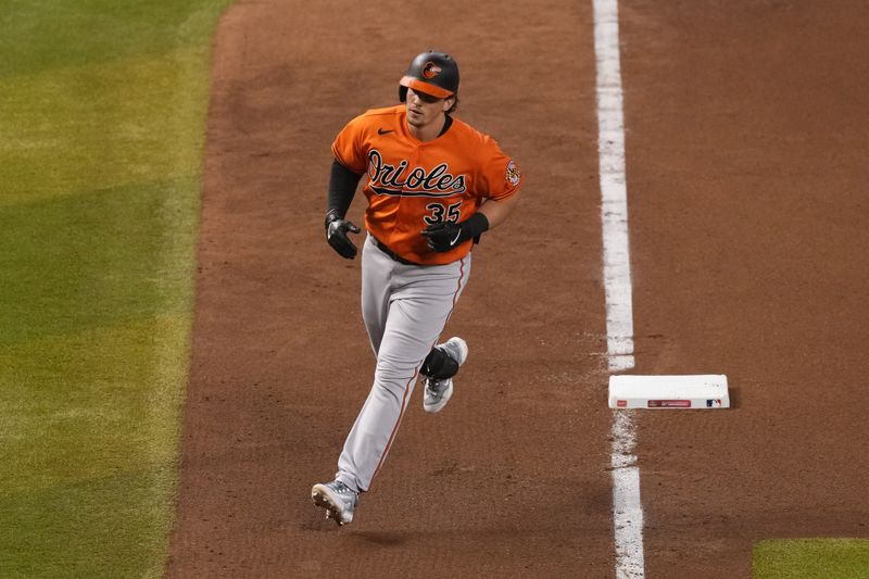 Sep 2, 2023; Phoenix, Arizona, USA; Baltimore Orioles catcher Adley Rutschman (35) runs the bases after hitting a solo home run against the Arizona Diamondbacks during the seventh inning at Chase Field. Mandatory Credit: Joe Camporeale-USA TODAY Sports