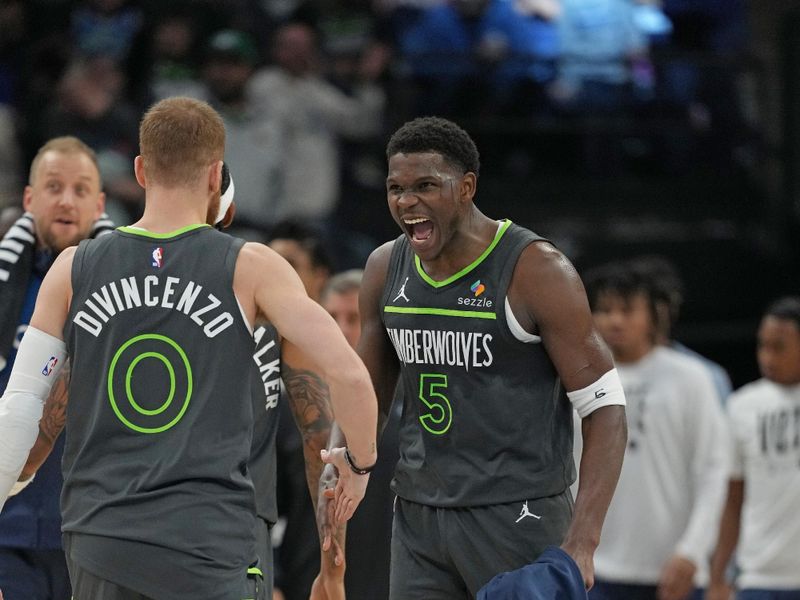 MINNEAPOLIS, MN - NOVEMBER 1: Anthony Edwards #5 of the Minnesota Timberwolves celebrates during the game against the Denver Nuggets on November 1, 2024 at Target Center in Minneapolis, Minnesota. NOTE TO USER: User expressly acknowledges and agrees that, by downloading and or using this Photograph, user is consenting to the terms and conditions of the Getty Images License Agreement. Mandatory Copyright Notice: Copyright 2024 NBAE (Photo by Jordan Johnson/NBAE via Getty Images)