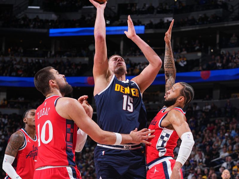 DENVER, CO - DECEMBER 13:  Nikola Jokic #15 of the Denver Nuggets shoots the ball during the game against the LA Clippers on December 13, 2024 at Ball Arena in Denver, Colorado. NOTE TO USER: User expressly acknowledges and agrees that, by downloading and/or using this Photograph, user is consenting to the terms and conditions of the Getty Images License Agreement. Mandatory Copyright Notice: Copyright 2024 NBAE (Photo by Bart Young/NBAE via Getty Images)